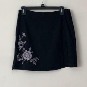 black skirt with blue and purple design